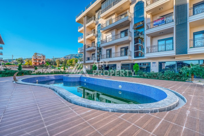 Квартира 1+1 в Оба, Алания, 55 кв.м. Новая резиденция - Ракурс 0