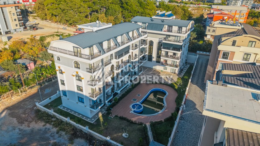 Квартира 1+1 в Оба, Алания, 55 кв.м. Новая резиденция - Ракурс 2