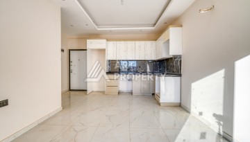 Квартира 1+1 в Оба, Алания, 55 кв.м. Новая резиденция - Ракурс 4