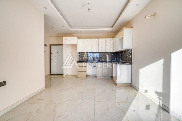 Квартира 1+1 в Оба, Алания, 55 кв.м. Новая резиденция - Ракурс 3