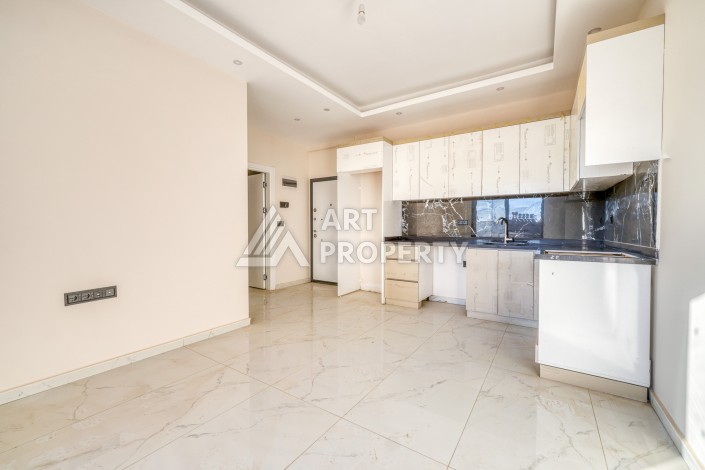 Квартира 1+1 в Оба, Алания, 55 кв.м. Новая резиденция - Ракурс 4