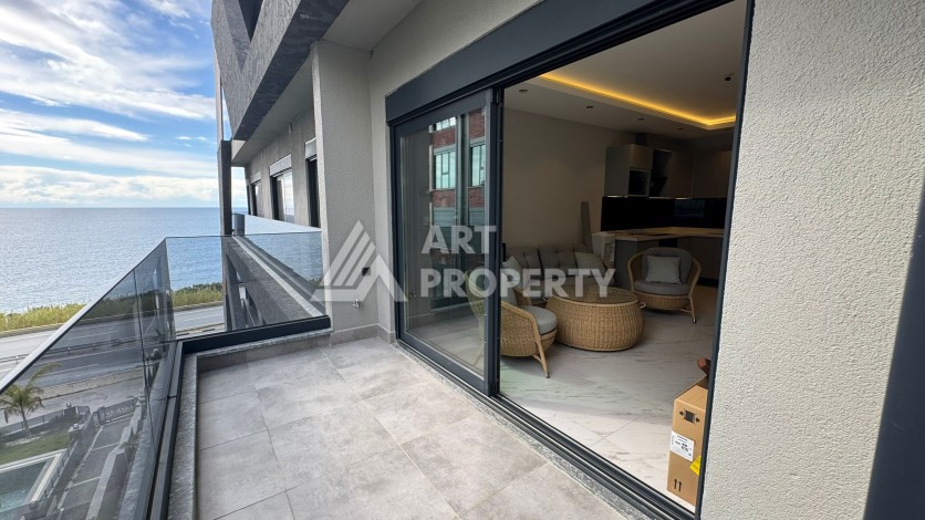 Квартира 1+1 с видом на море, 60 м² в Каргыджаке, Алания. - Ракурс 0