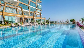 Элитная квартира 1+1 на первой линии в Каргыджаке, Алания - Ракурс 1