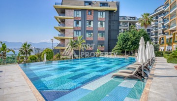 Элитная квартира 1+1 на первой линии в Каргыджаке, Алания - Ракурс 25