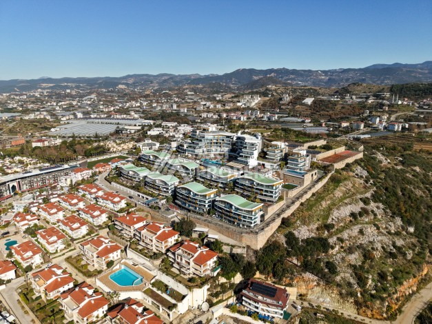 Уютная квартира 2+1 в тихом районе Конаклы, всего в 500 метрах от моря. - Ракурс 18