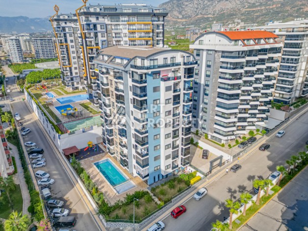 Современная квартира 1+1 в новом доме 2023 года в Махмутларе в 550 метрах от моря - Ракурс 0