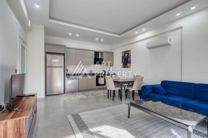 Современная квартира 1+1 в новом доме 2023 года в Махмутларе в 550 метрах от моря - Ракурс 8