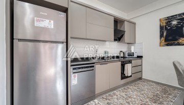 Современная квартира 1+1 в новом доме 2023 года в Махмутларе в 550 метрах от моря - Ракурс 11