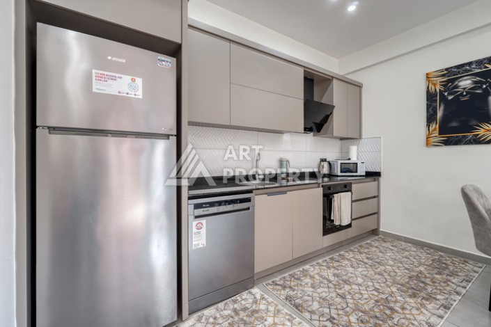 Современная квартира 1+1 в новом доме 2023 года в Махмутларе в 550 метрах от моря - Ракурс 10