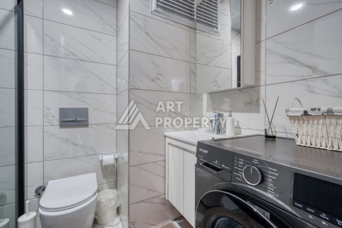 Современная квартира 1+1 в новом доме 2023 года в Махмутларе в 550 метрах от моря - Ракурс 11