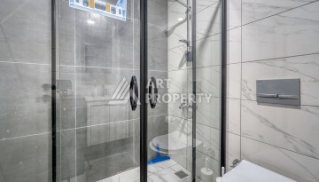 Современная квартира 1+1 в новом доме 2023 года в Махмутларе в 550 метрах от моря - Ракурс 13