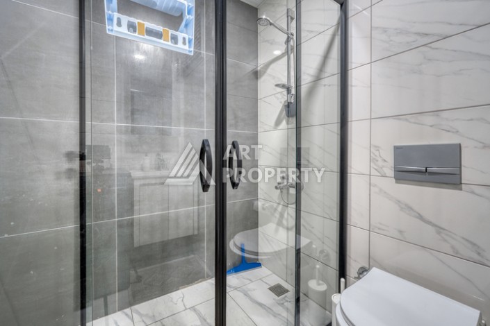 Современная квартира 1+1 в новом доме 2023 года в Махмутларе в 550 метрах от моря - Ракурс 12