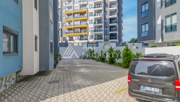 Современная квартира 1+1 в новом доме 2023 года в Махмутларе в 550 метрах от моря - Ракурс 19