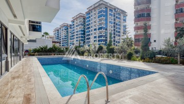 Современная квартира 1+1 в новом доме 2023 года в Махмутларе в 550 метрах от моря - Ракурс 25