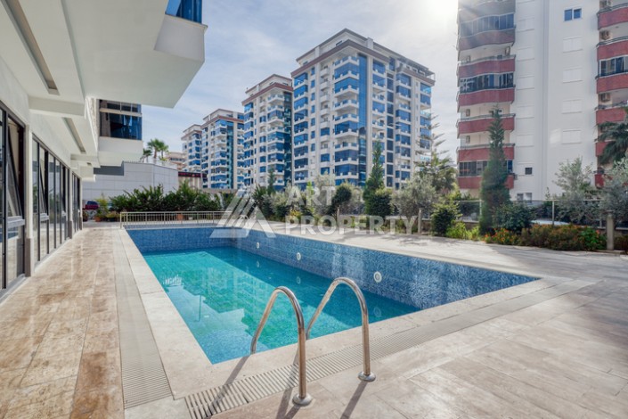 Современная квартира 1+1 в новом доме 2023 года в Махмутларе в 550 метрах от моря - Ракурс 24