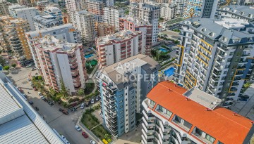 Современная квартира 1+1 в новом доме 2023 года в Махмутларе в 550 метрах от моря - Ракурс 26