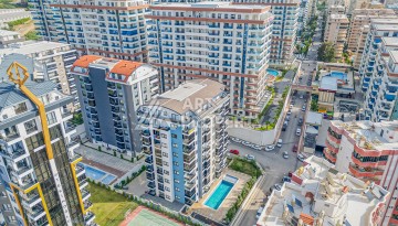 Современная квартира 1+1 в новом доме 2023 года в Махмутларе в 550 метрах от моря - Ракурс 27