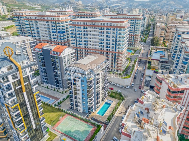 Современная квартира 1+1 в новом доме 2023 года в Махмутларе в 550 метрах от моря - Ракурс 26