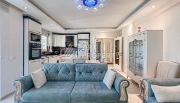 Квартира 1+1 с боковым видом на море в Махмутларе в 600 метрах от пляжа - Ракурс 1