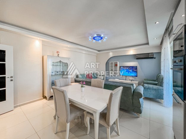 Квартира 1+1 с боковым видом на море в Махмутларе в 600 метрах от пляжа - Ракурс 1