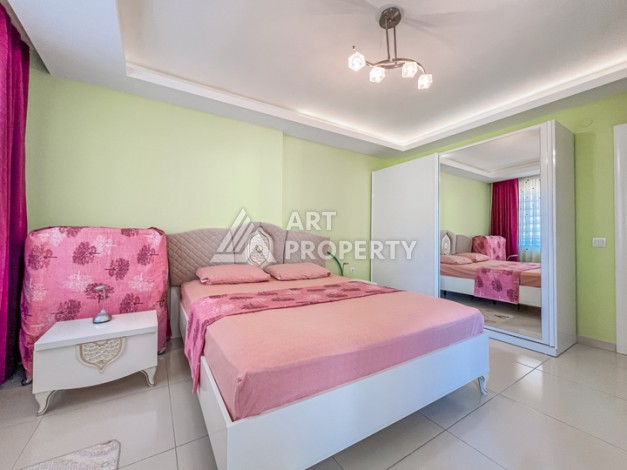 Квартира 1+1 с боковым видом на море в Махмутларе в 600 метрах от пляжа - Ракурс 4