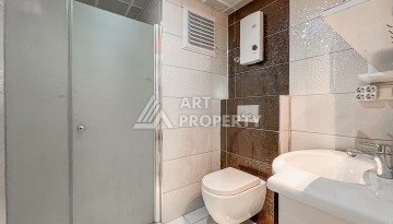 Квартира 1+1 с боковым видом на море в Махмутларе в 600 метрах от пляжа - Ракурс 6