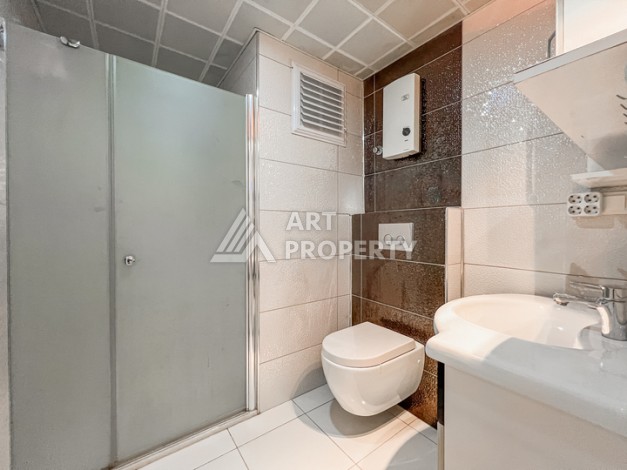 Квартира 1+1 с боковым видом на море в Махмутларе в 600 метрах от пляжа - Ракурс 5