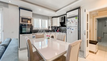 Квартира 1+1 с боковым видом на море в Махмутларе в 600 метрах от пляжа - Ракурс 7