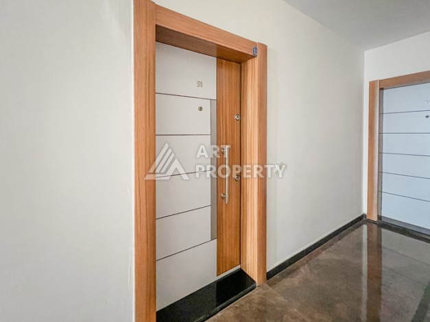 Квартира 1+1 с боковым видом на море в Махмутларе в 600 метрах от пляжа - Ракурс 9