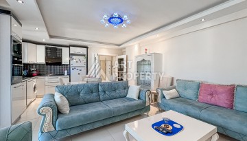 Квартира 1+1 с боковым видом на море в Махмутларе в 600 метрах от пляжа - Ракурс 11