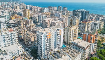 Квартира 1+1 с боковым видом на море в Махмутларе в 600 метрах от пляжа - Ракурс 21