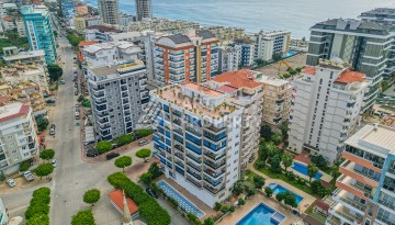 Просторная квартира 1+1 в Махмутларе в 200 метрах от моря с панорамными видами - Ракурс 1