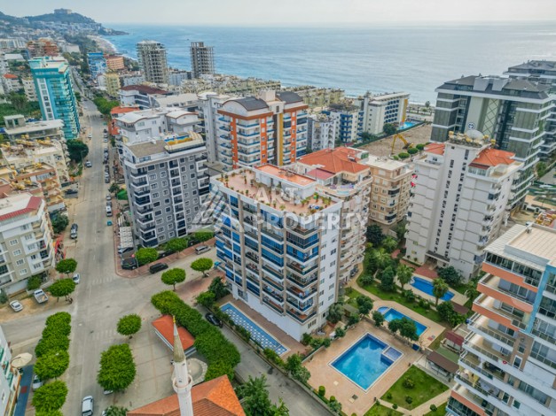 Просторная квартира 1+1 в Махмутларе в 200 метрах от моря с панорамными видами - Ракурс 0