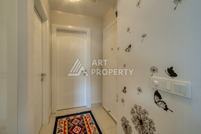 Просторная квартира 1+1 в Махмутларе в 200 метрах от моря с панорамными видами - Ракурс 1