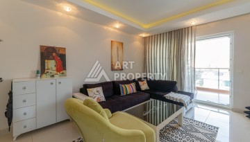 Просторная квартира 1+1 в Махмутларе в 200 метрах от моря с панорамными видами - Ракурс 3