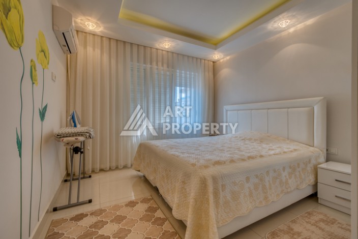 Просторная квартира 1+1 в Махмутларе в 200 метрах от моря с панорамными видами - Ракурс 6