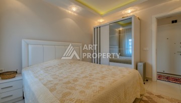 Просторная квартира 1+1 в Махмутларе в 200 метрах от моря с панорамными видами - Ракурс 9