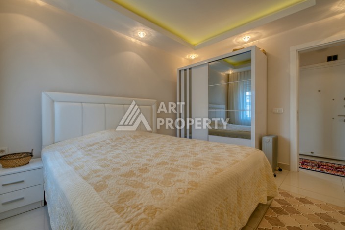 Просторная квартира 1+1 в Махмутларе в 200 метрах от моря с панорамными видами - Ракурс 8