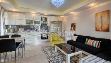 Просторная квартира 1+1 в Махмутларе в 200 метрах от моря с панорамными видами - Ракурс 11