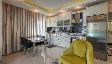 Просторная квартира 1+1 в Махмутларе в 200 метрах от моря с панорамными видами - Ракурс 12