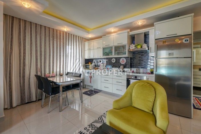 Просторная квартира 1+1 в Махмутларе в 200 метрах от моря с панорамными видами - Ракурс 11