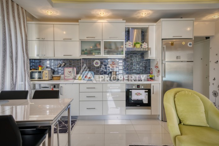 Просторная квартира 1+1 в Махмутларе в 200 метрах от моря с панорамными видами - Ракурс 15