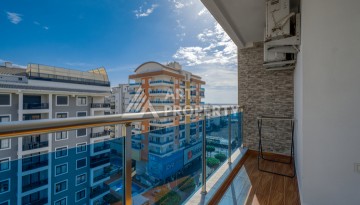 Просторная квартира 1+1 в Махмутларе в 200 метрах от моря с панорамными видами - Ракурс 19