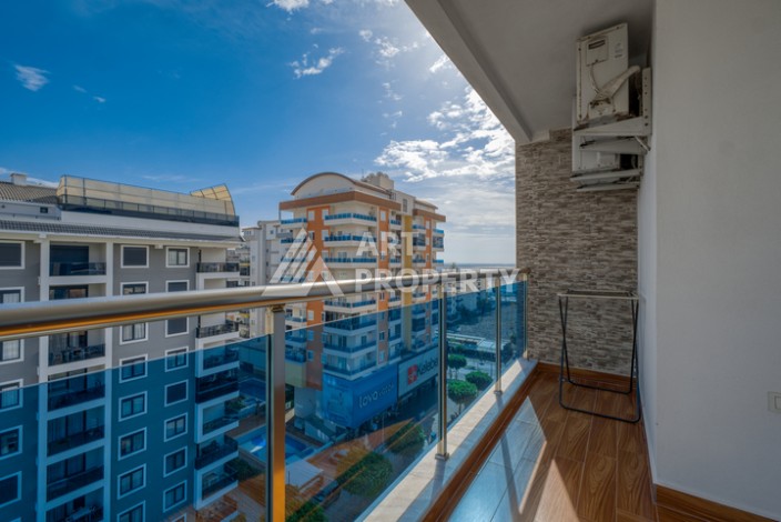 Просторная квартира 1+1 в Махмутларе в 200 метрах от моря с панорамными видами - Ракурс 18