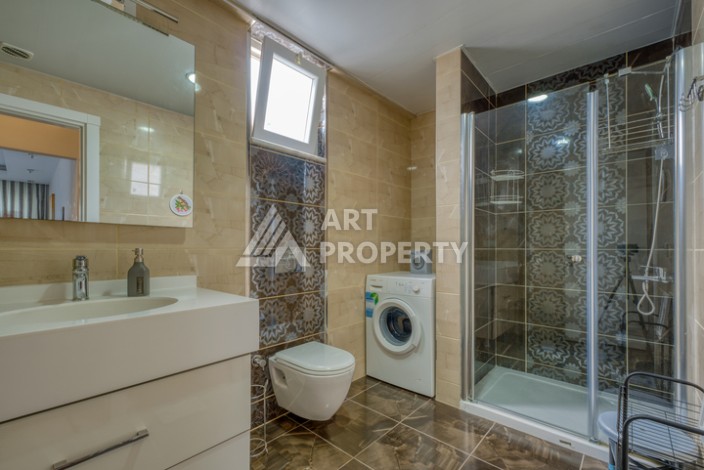 Просторная квартира 1+1 в Махмутларе в 200 метрах от моря с панорамными видами - Ракурс 20