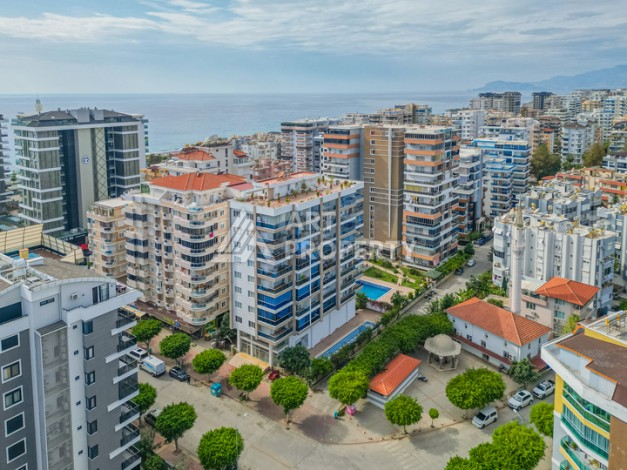 Просторная квартира 1+1 в Махмутларе в 200 метрах от моря с панорамными видами - Ракурс 24