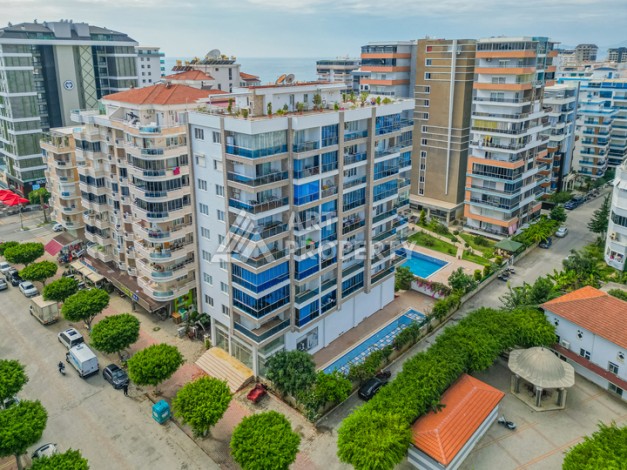 Просторная квартира 1+1 в Махмутларе в 200 метрах от моря с панорамными видами - Ракурс 25