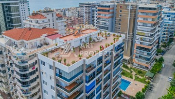 Просторная квартира 1+1 в Махмутларе в 200 метрах от моря с панорамными видами - Ракурс 27