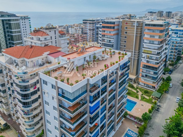 Просторная квартира 1+1 в Махмутларе в 200 метрах от моря с панорамными видами - Ракурс 26