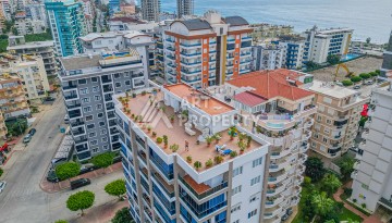 Просторная квартира 1+1 в Махмутларе в 200 метрах от моря с панорамными видами - Ракурс 28